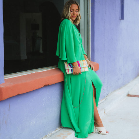 Gorgeous green maxi dress with colorful beaded purse from generatoarekipor boutique in Poland City